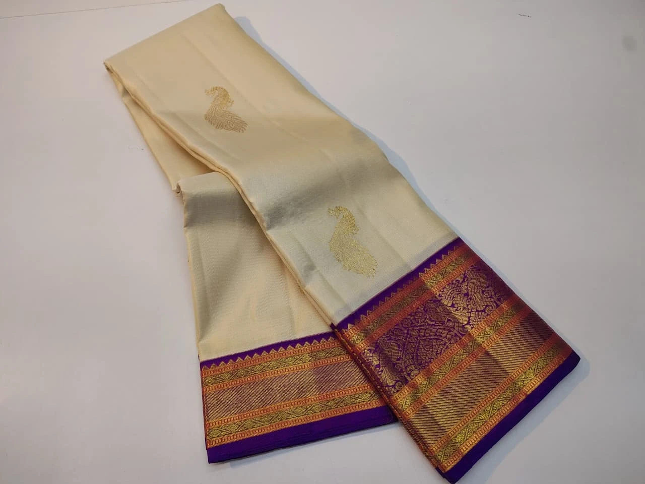 Purple Peacock Zari Border and Woven Motifs Saree